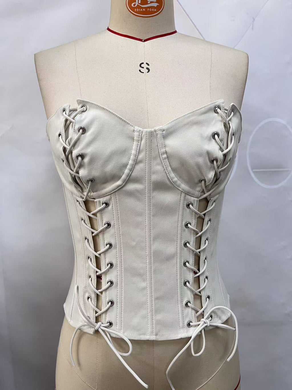 Europe and America INS French-style fishbone corset top with waist-cinching straps, a sexy and stylish backless design, and a fitted silhouette