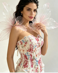 Model wearing a floral lace corset top with sweetheart neckline and lace-up back