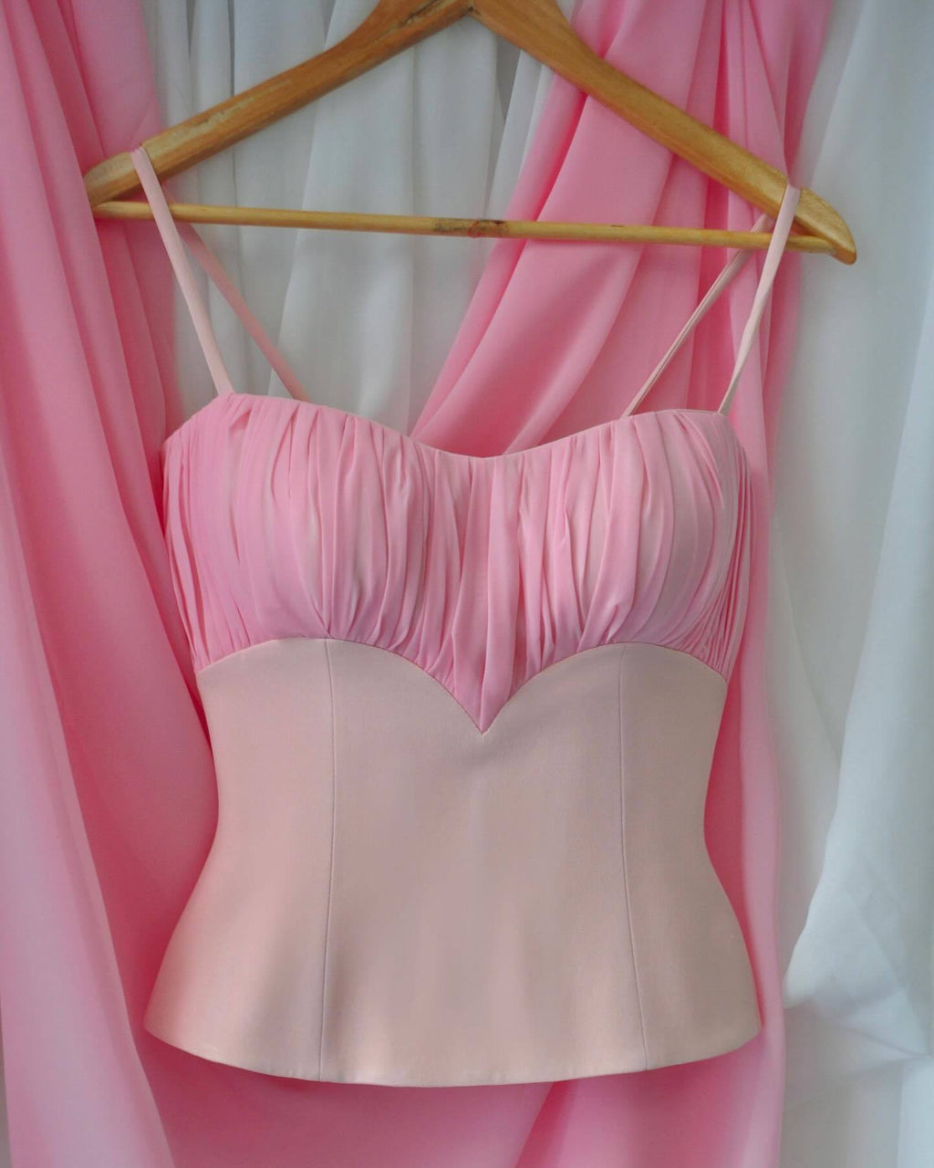 Sweet girl style pink wrap top with heart-shaped neckline, dense pleated design, vertical paneling, fishbone waist, and short back