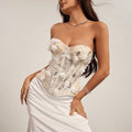 French ins Elegant, figure-flattering, sequined, and tie-up halter top with a fishbone design, featuring a three-dimensional floral pattern71491